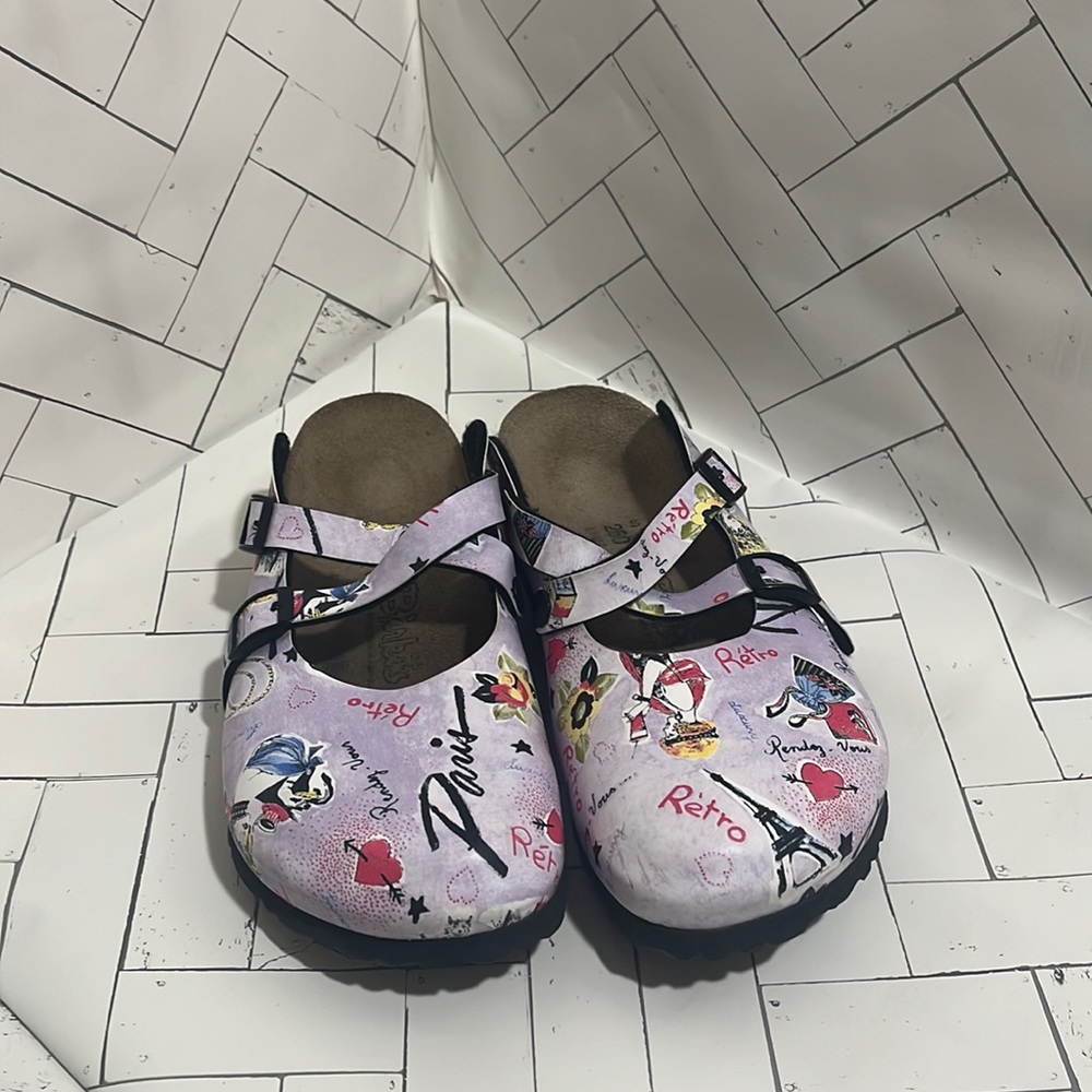 Rendezvous vous retro Paris style purple Birkenstocks.